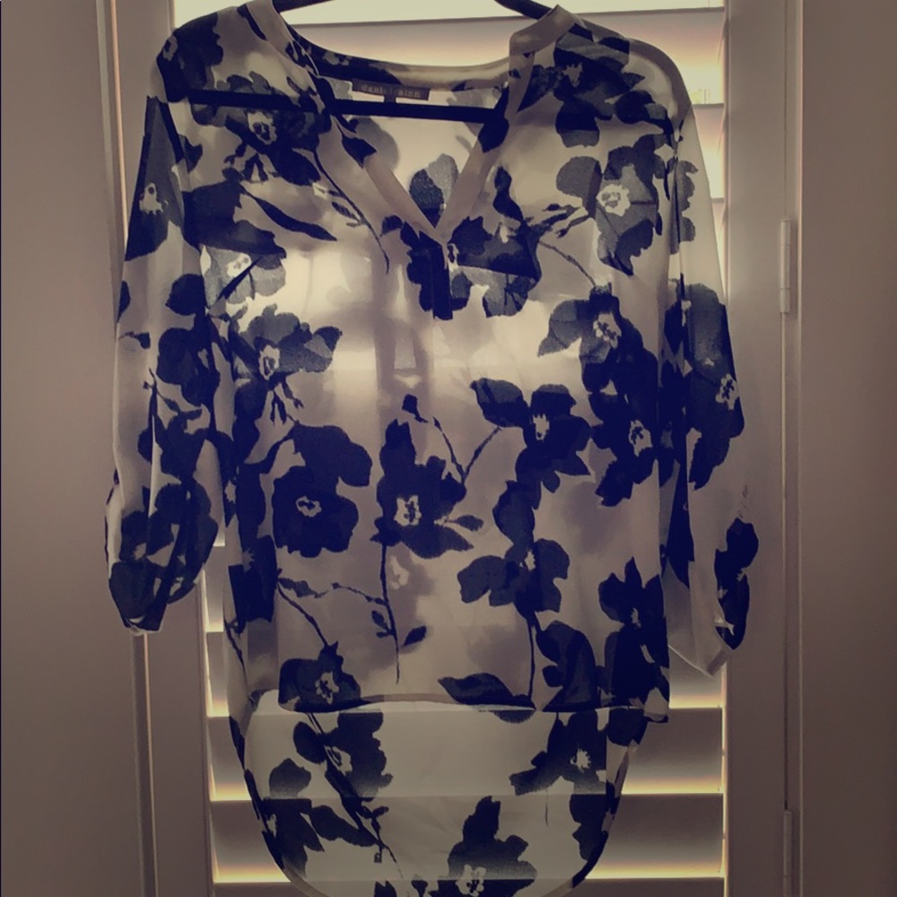 White shirt with black flower print